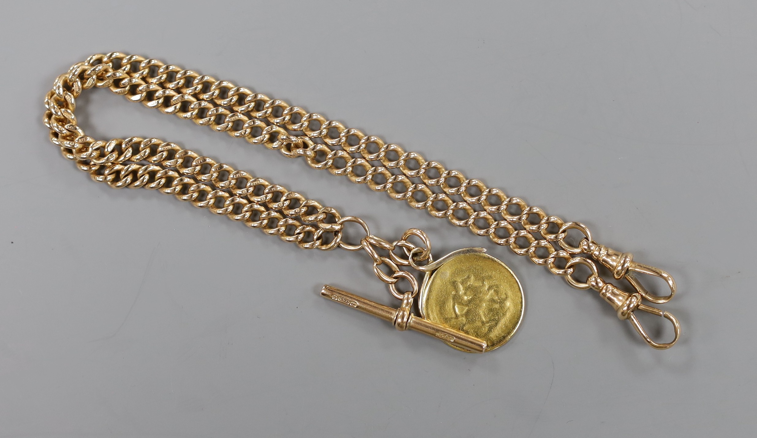 An early 20th century 9ct gold albert, 50cm, hung with a very worn sovereign, gross weight 49.6 grams.